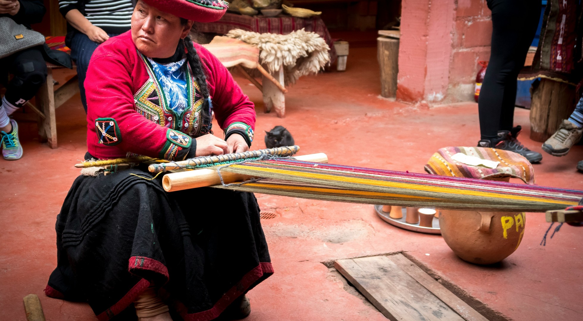 woman weaving in peru